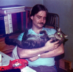 10 Buzz holding our second cat Tiger.jpg